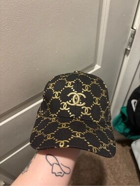 CHANEL Black and Gold Logo Baseball Cap